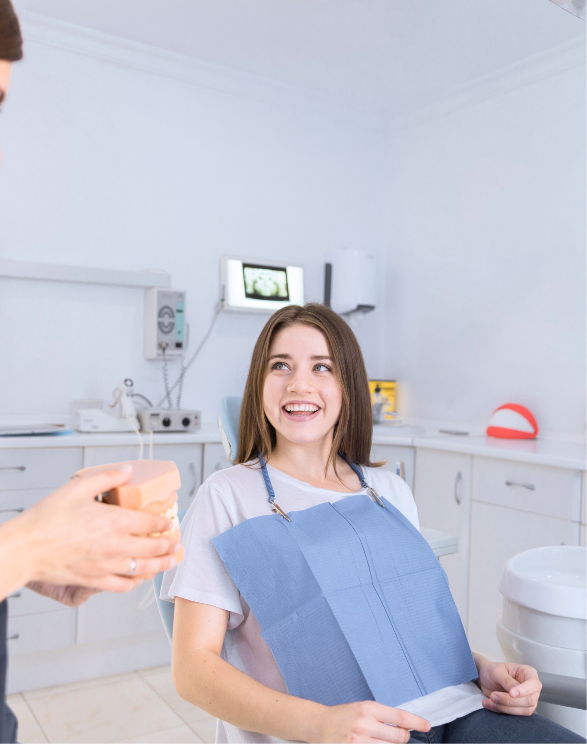 Woman Smiling During A Dental Consultation